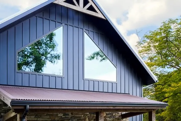 Angled trapezoid-shaped windows in a gable end