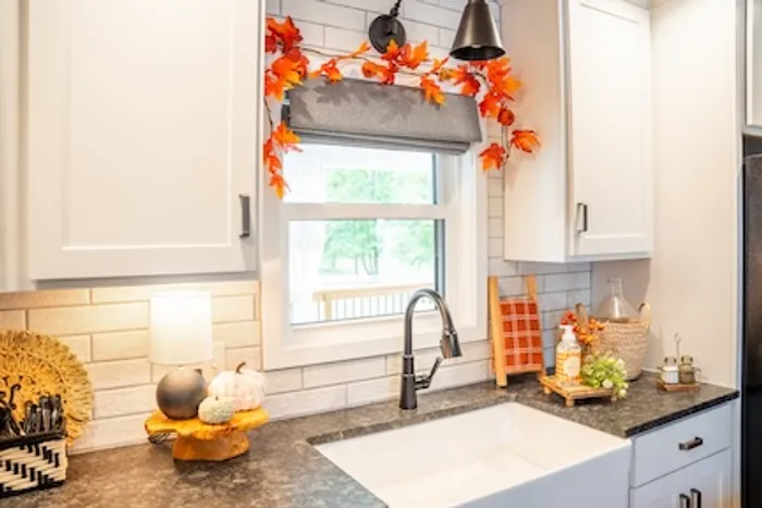 White double-hung window above a kitchen sink